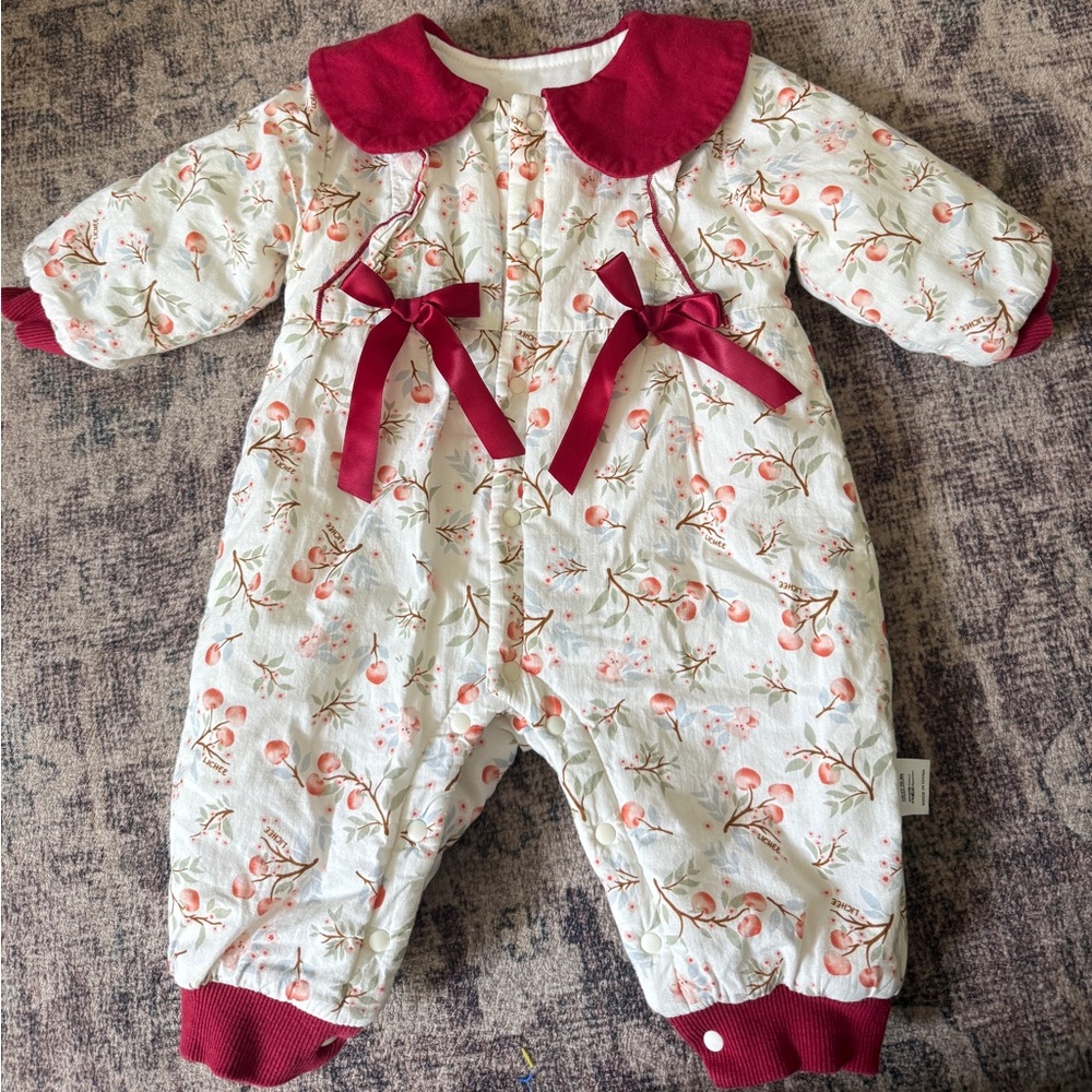 Quilted Floral Baby One-Piece with Red Collar and Bows